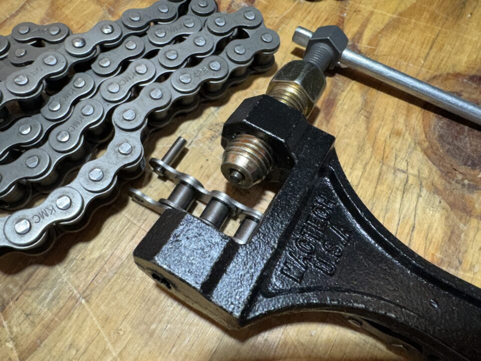 a chain and tool on a table